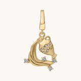 Gold pendant with white topaz stone accents on a white background