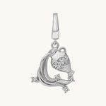 Silver pendant with intricate design of water flowing out of a jar on a white background