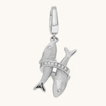 Silver Pisces zodiac charm on a white background