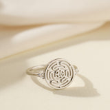 Silver Hecate's Wheel Ring on Cream Background
