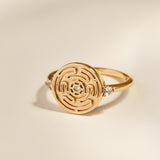 Gold Hecate's Wheel Ring on Cream Background