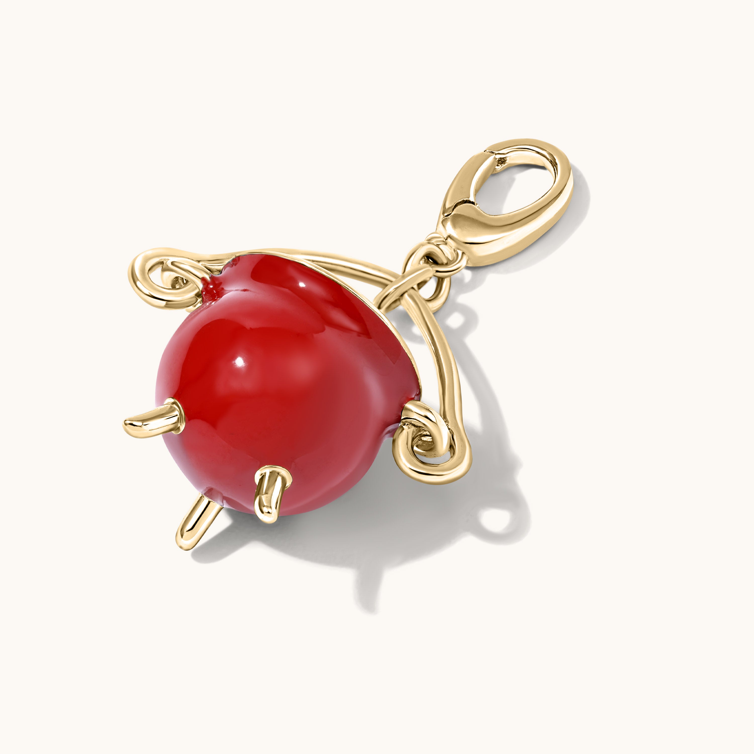 Red Cauldron charm on a white background