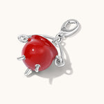 Red Cauldron Charm with Silver accents on a white background