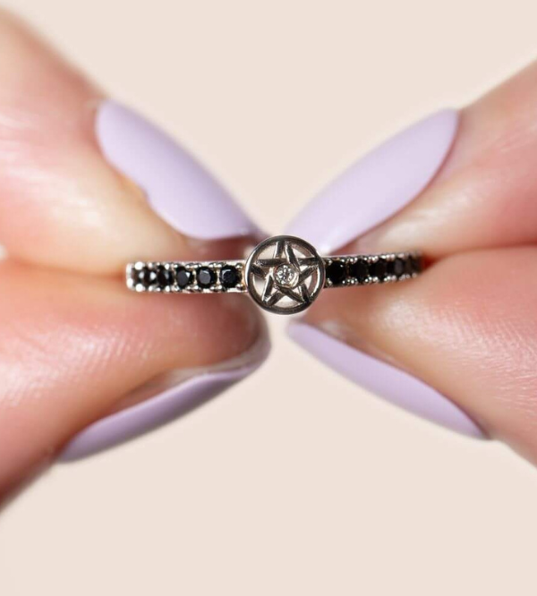 Blessed Be Magick_Pentacle Gemstone Ring Silver held by Model 3_600 x 800.png