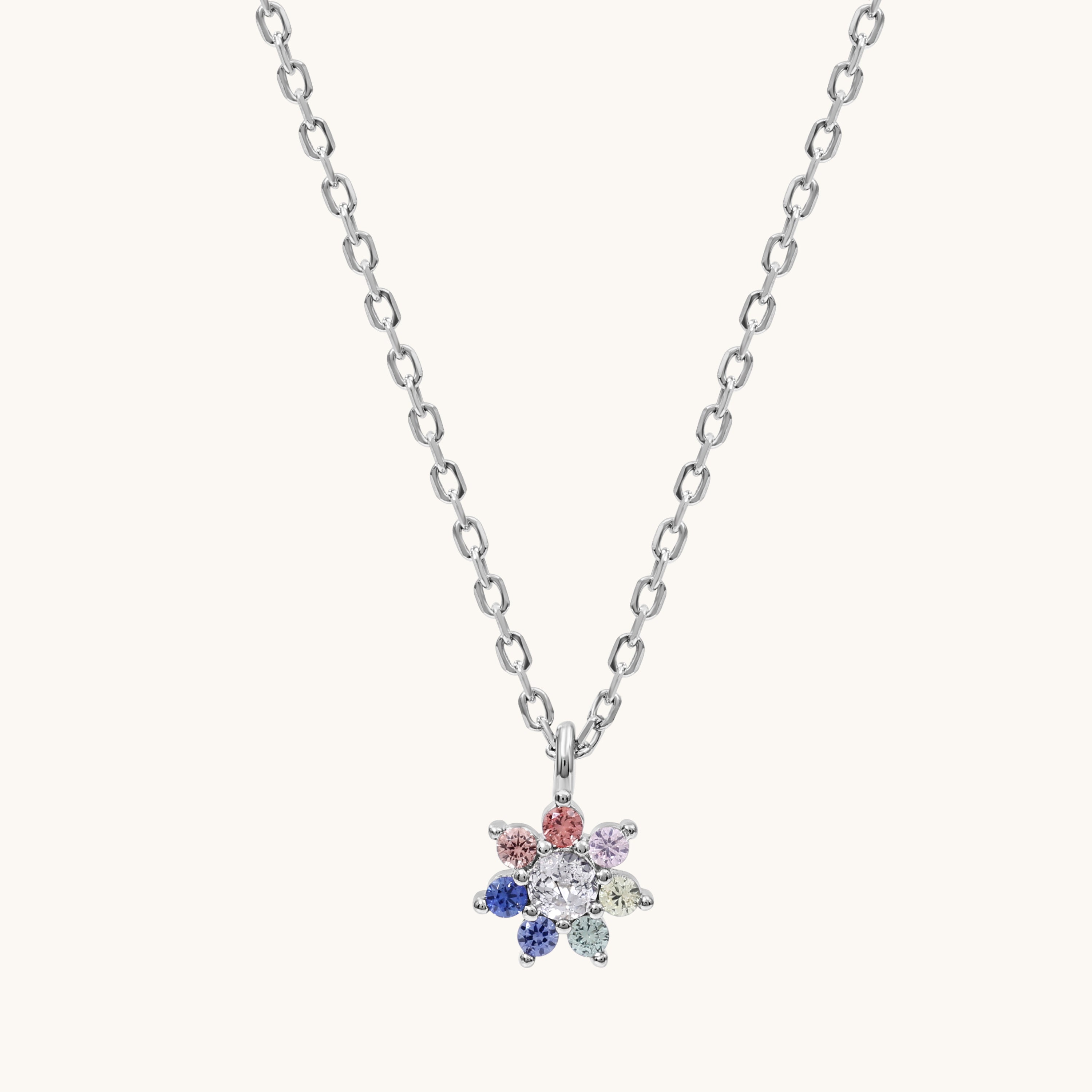 Necklace with a colorful flower-shaped pendant on a white background